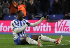 BRIGHTON, ENGLAND - FEBRUARY 14: Yankuba Minteh of Brighton & Hove Albion celebrates after he scored for 3-0 during the Premier League match between Brighton & Hove Albion FC and Chelsea FC at Amex Stadium on February 14, 2025 in Brighton, England. (Photo by Shaun Brooks - CameraSport via Getty Images)
