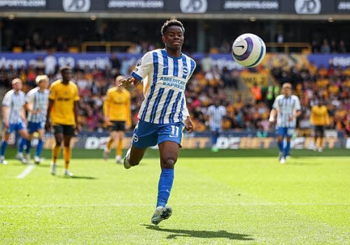 WOLVERHAMPTON, ENGLAND - MAY 10: 
#11, Simon Adingra of Brighton races after the ball during the Premier League match between Wolverhampton Wanderers FC and Brighton & Hove Albion FC at Molineux on May 10, 2025 in Wolverhampton, England. (Photo by MB Media/Getty Images)