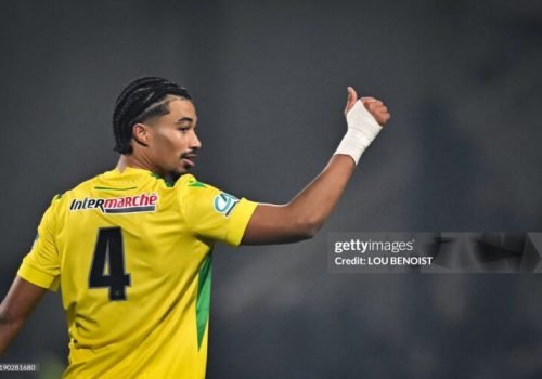 Nantes' French defender #44 Nathan Zeze celebrates after scoring the team's third tryduring the French Cup round of 64 football match between Drancy JA and FC Nantes, at the Bauer Stadium in Saint-Ouen, outside Paris, on December 21, 2024. (Photo by Lou BENOIST / AFP) (Photo by LOU BENOIST/AFP via Getty Images)