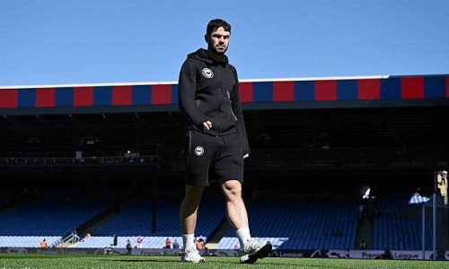 LONDON, ENGLAND - APRIL 05: Eiran Cashin of Brighton & Hove Albion inspects the pitch prior to the Premier League match between Crystal Palace FC and Brighton & Hove Albion FC at Selhurst Park on April 05, 2025 in London, England. (Photo by Mike Hewitt/Getty Images)
