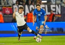 NITRA, SLOVAKIA - JUNE 12: Brajan Gruda of U21 Germany in action against Enrik Ostrc of U21 Slovenia during the UEFA European Under-21 Championship 2025 Group Stage match between Germany and Slovenia at Nitra Stadium on June 12, 2025 in Nitra, Slovakia. (Photo by Christian Hofer/Getty Images)