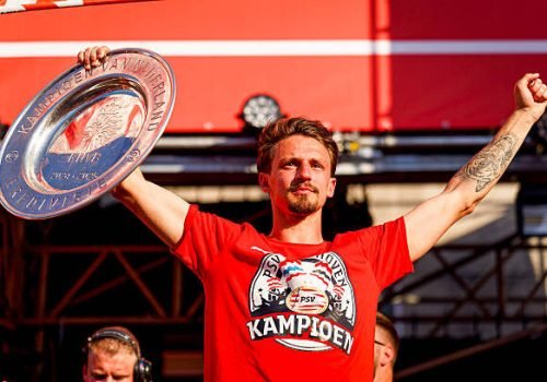 EINDHOVEN, NETHERLANDS - MAY 19: Olivier Boscagli of PSV with the championship trophy during the PSV Championship Celebrations at Stadhuisplein on May 19, 2025 in Eindhoven, Netherlands. (Photo by Joris Verwijst/BSR Agency/Getty Images)